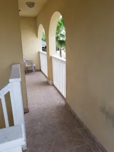 This is patio as you come up the stairs. Not super wide but enough space to hang out for a glass of wine!