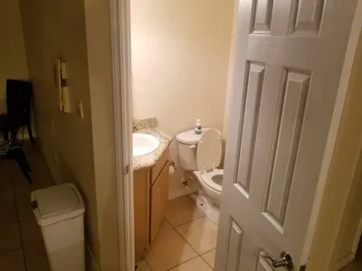 half bath off living room means if people sleep out there, they do not disturb bedrooms. RARE to find a 2 bedroom / 3 bathroom on the Island