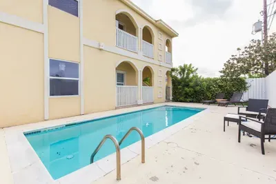 alternative shot of pool . Ground floor unit there is unit 2. Upstairs is unit 4 which I do not rent short term (long term tenants)