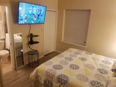 50" flat screen in Master bedroom w/cable. Note bathroom is private right off.