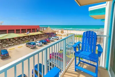 Relax on your balcony with stunning ocean views and fresh sea breezes. Perfect spot to enjoy morning coffee or evening sunsets while overlooking the beach and nearby dining. A serene retreat just steps from the sand.