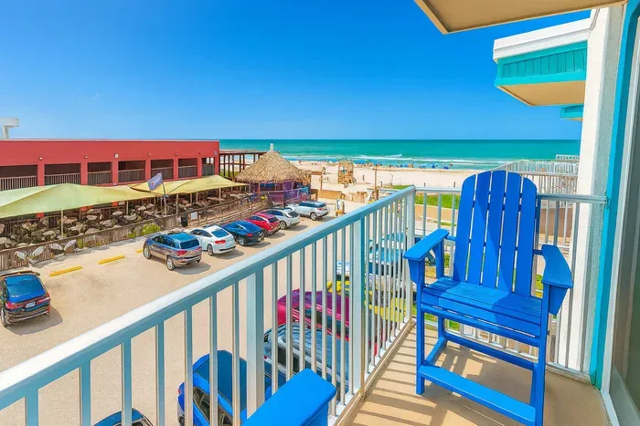 Relax on your balcony with stunning ocean views and fresh sea breezes. Perfect spot to enjoy morning coffee or evening sunsets while overlooking the beach and nearby dining. A serene retreat just steps from the sand.
