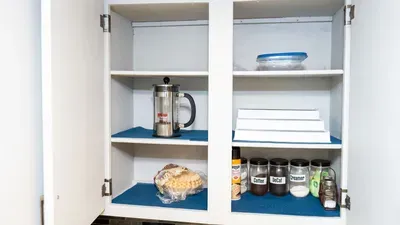 Enjoy your morning ritual with a French press, labeled jars for coffee, decaf, and creamer, plus extra essentials. With mugs, bread, and condiments ready, everything is set for a relaxed start to your day.