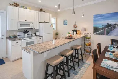 Bright Coastal Kitchen + Dining | Granite Counters | Beach Décor | Walk to Shore | STR-Ready