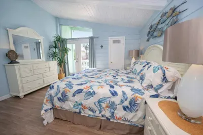 Tropical Coastal Retreat | Comfortable Bed + Balcony | Steps to Beach + Dining