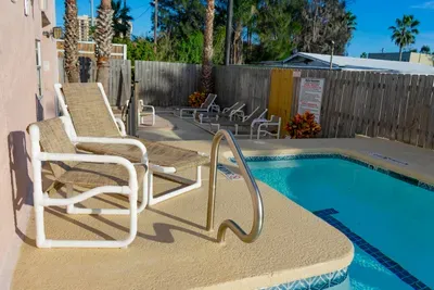 Bright Poolside Escape
Clear blue pool, sunny deck, and fenced surroundings create an inviting space for unwinding, swimming laps, or enjoying quiet afternoons outdoors.