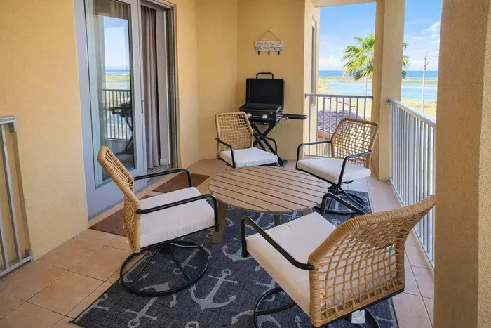 Oceanview Balcony Retreat with Grill & Cozy Seating – Steps from the Beach, Perfect for Morning Coffee or Sunset Cocktails