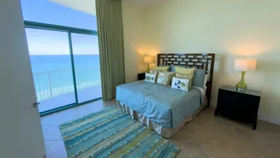 A calm, coastal bedroom with soft tones natural light & a relaxed layout that feels instantly welcoming. The simple styling & gentle colors create an easy, unhurried atmosphere, offering a comfortable place to settle in & enjoy the view at your pace.