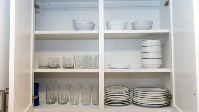 Feel right at home with a full set of quality glassware, bowls and plates for every meal. This well-appointed kitchen ensures guests have everything needed for relaxed dining and effortless entertaining during their stay.