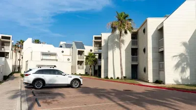 Enjoy convenient on-site parking and easy access in this welcoming South Padre Island condo community. The property offers tropical landscaping and a clean, well-maintained exterior—ideal for guests seeking comfort and relaxation near the beach.