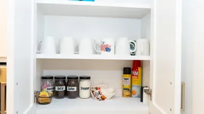 Start your mornings right in a well-stocked kitchen with a variety of mugs, coffee, tea, sweeteners and creamer. Guests enjoy thoughtful amenities like cooking spray and filters, ensuring convenience and comfort throughout their stay.