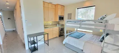 A bright, thoughtfully arranged studio where simple touches and natural light create an easy, relaxed rhythm. The open layout blends rest and daily living comfortably, offering a calm place to settle in and feel at ease throughout your stay.