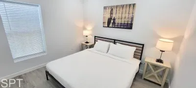 A clean, peaceful room where soft light and simple décor create an easy sense of comfort. The balanced layout and warm touches make it a relaxing place to settle in, offering a gentle rhythm that feels welcoming from the moment you arrive.