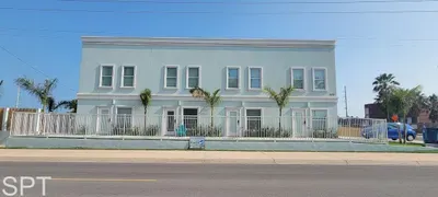 A bright, welcoming building with a clean, easygoing presence that sets a relaxed tone from the start. Its simple lines and open feel create a steady sense of comfort, offering a peaceful base to settle into and enjoy an unhurried stay.