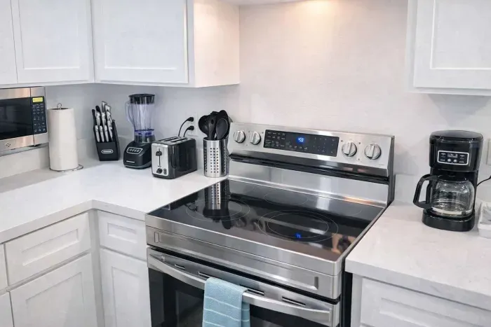 Modern Kitchen with Stainless Steel Appliances, Blender, Coffee Maker & Toaster – Fully Equipped for Cooking & Morning Routines