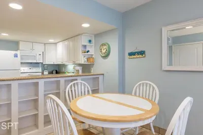 A bright, simple dining space that feels easy and welcoming, with soft colors and a relaxed flow that makes shared meals feel unhurried. The clean layout and cozy atmosphere create a comfortable spot to gather, chat, and enjoy slow moments together.