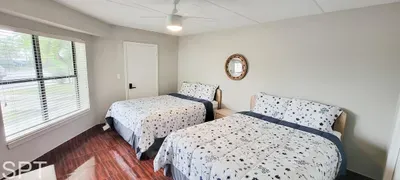 Calm, double‑bed room with an easy, relaxed feel—soft light, simple décor, and a clean layout that makes settling in feel natural. A grounded, welcoming space that carries a genuine coastal ease without relying on amenities to define it.