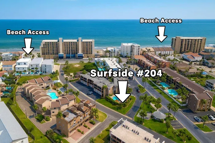 Surfside #204: Prime Beachfront Condo w/ Multiple Access Points & Pool. Aerial panorama reveals Surfside #204 nestled amid Gulf high-rises, sparkling community pool, palm accents & direct beach access paths on three sides.