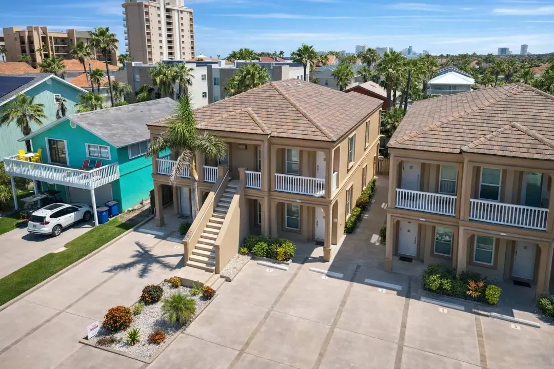 Coastal Townhomes + Vibrant Turquoise Retreat | Walk to Beach | Parking + Balcony Views + Palm Trees