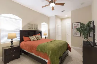 A warm, grounded bedroom with rich tones and a calm, steady feel that makes settling in effortless. The simple layout and cozy atmosphere create an inviting space that supports slow mornings, easy evenings and a naturally relaxed stay.
