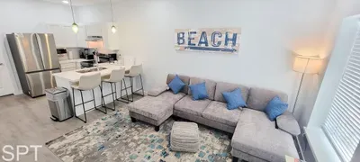 A bright, welcoming space where soft coastal notes and clean lines create an easy, relaxed flow. The open layout and gentle tones bring a steady sense of comfort, offering a naturally calming place to unwind and settle into your stay.