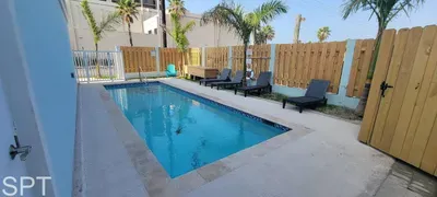 A bright, open pool area with a clean, laid‑back feel that encourages you to slow down and settle in. The gentle atmosphere and uncluttered space make it an inviting place to relax, recharge, and enjoy a moment of calm at your own pace.