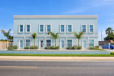 Stylish Coastal Duplex | Steps to Beach | Palm-Lined Patio | Bright Interiors | Fast Wi-Fi | Ideal for Families & Groups | Walk to Dining & Shops | Free Parking | 3 Units Available