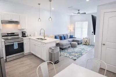 Bright Coastal Retreat | Modern Kitchen + Stylish Living | Steps to Beach & Dining