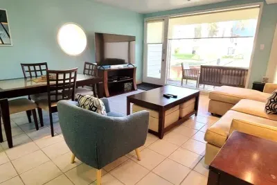 Clean & Modern
Modern Open Living Area • Stainless Kitchen, Dining Table & Comfortable Lounge • Steps from Beach, Pier & Island Fun