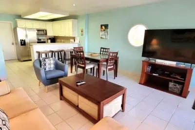 Modern & Spacious
Bright Open‑Concept Living • Modern Kitchen, Dining for Four & Cozy Lounge • Perfect for Families Near Beach & Island Hotspots