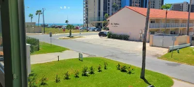 Bright & Beachy
Vibrant pink coastal home with a spacious balcony, palm‑lined yard, and easy access to island attractions—an inviting retreat for relaxed beachside living.
