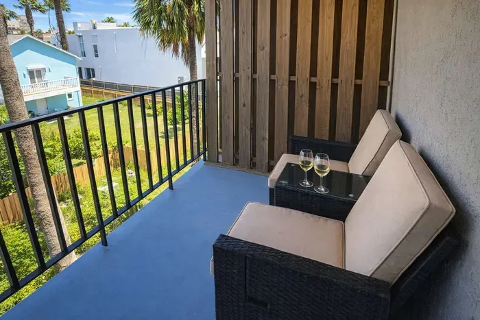 Cozy Balcony Retreat | Wine & Views | Walk to Beach & Dining