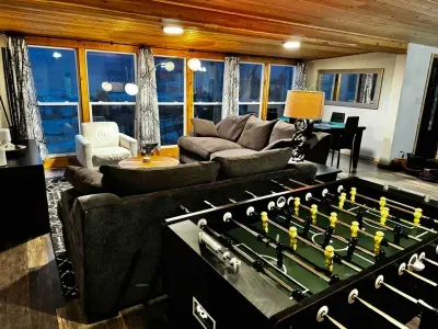Kick back & play! Our cozy Airbnb offers a table soccer setup. Enjoy entertainment and unforgettable memories. 