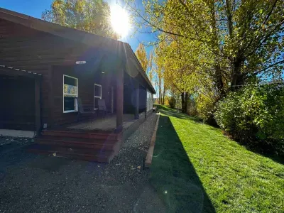 Covered front porch perfect to watch the rain storms while drinking coffee. 