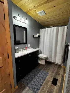 New shared full bath next to rooms 2, 3, and 4. Full tub and shower. 