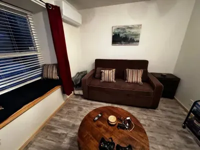 Children's play area, toy storage, window seat.