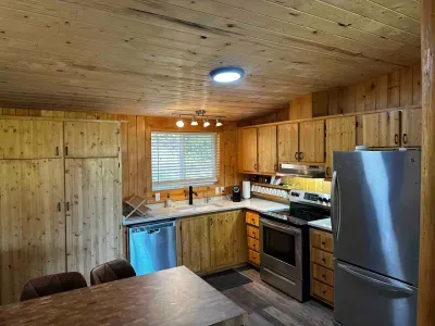 Fully stocked kitchen with all the pots, pans, blender, coffee maker, spices etc to cook for 8.  Brand new granite countertops.