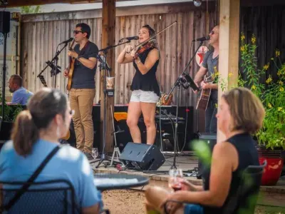 Live music under Idaho skies, cozy outdoor seating, and rustic charm.