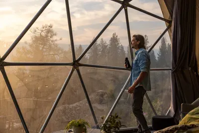Panoramic forest views from a stunning geodesic dome retreat