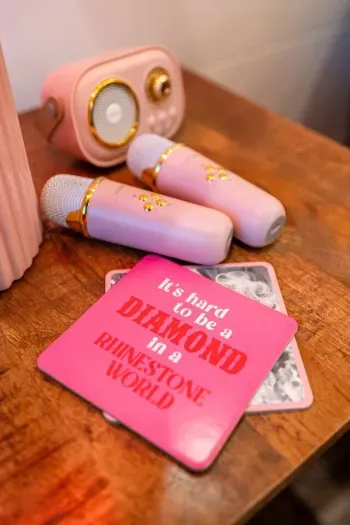 A pink mic and a little Dolly attitude never hurt nobody