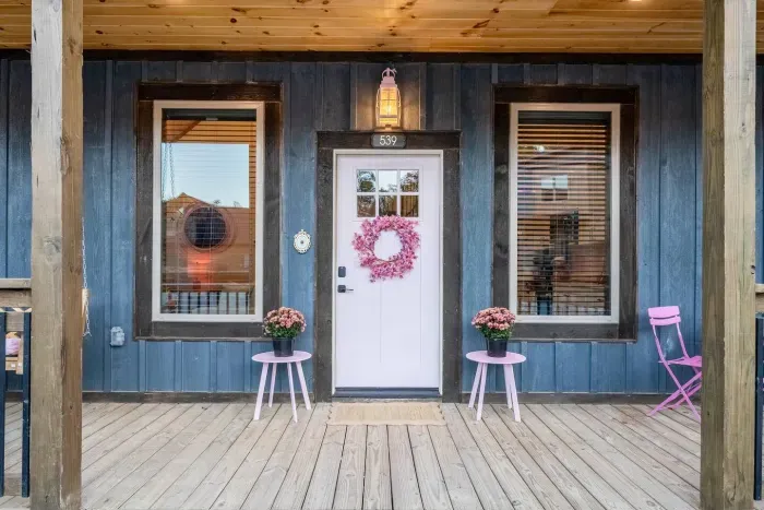 Step into your dream stay — where the flowers are pink, the door is cuter, and the vibes are immaculate.