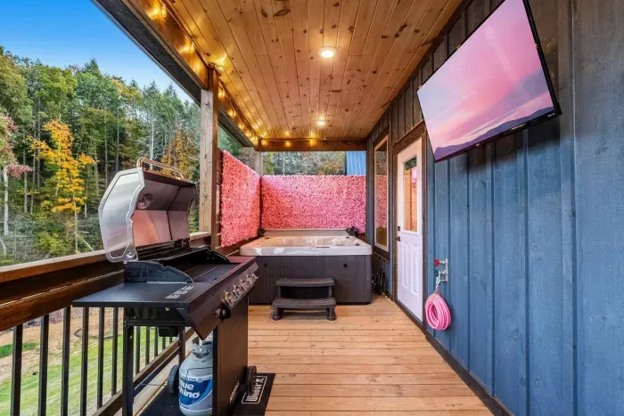Curl up and watch your favorite show from the couch or the hot tub!