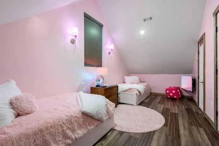 From the fluffy bedding to the soft glow, every inch was made for unwind time.