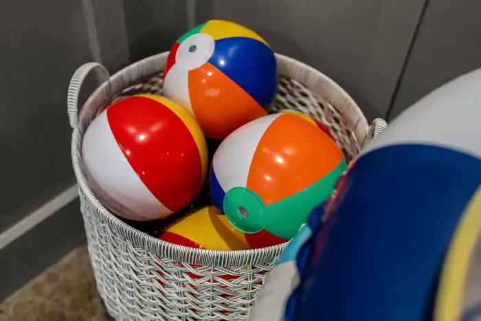 Add a splash of fun—colorful beach balls make every pool day feel like summer