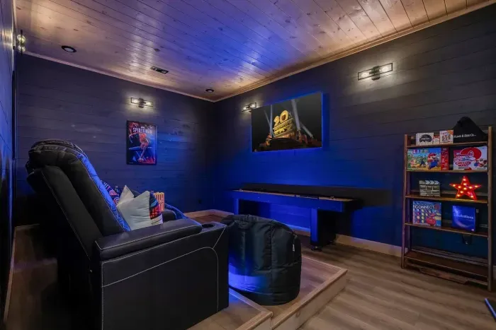 Popcorn, dim lights, and your favorite film—there’s no better place to press play.