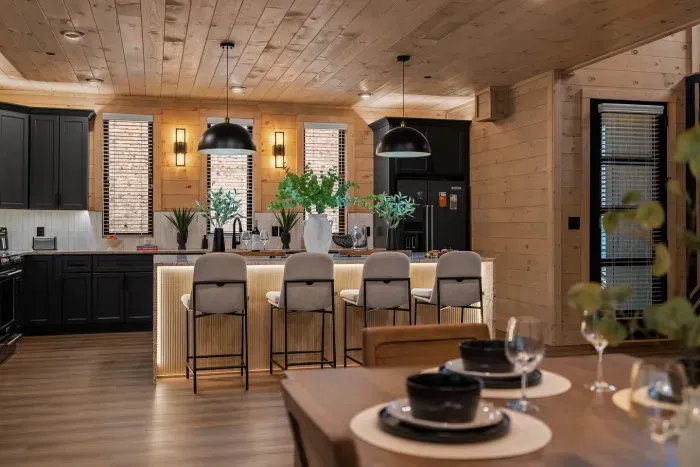 Expansive counters and a soft, inviting glow — the perfect setting to gather, cook, and share moments that feel like home.