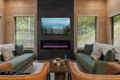 Cozy up by the modern fireplace and enjoy a movie night
