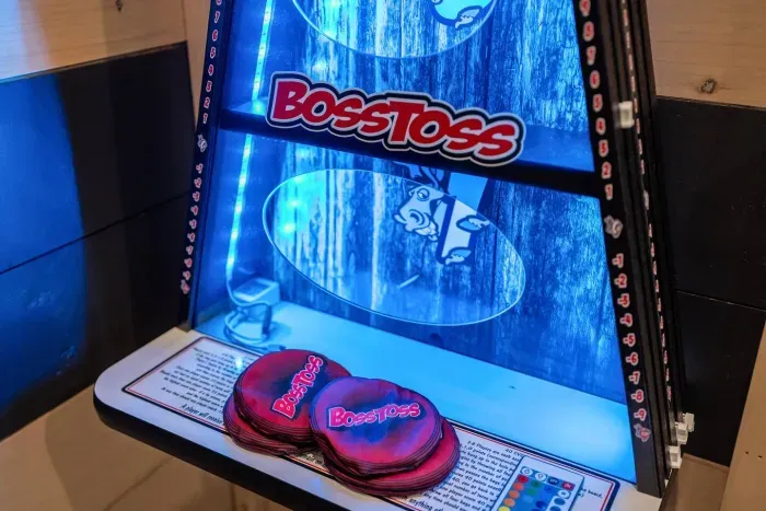 Test your aim and claim victory with Boss Toss