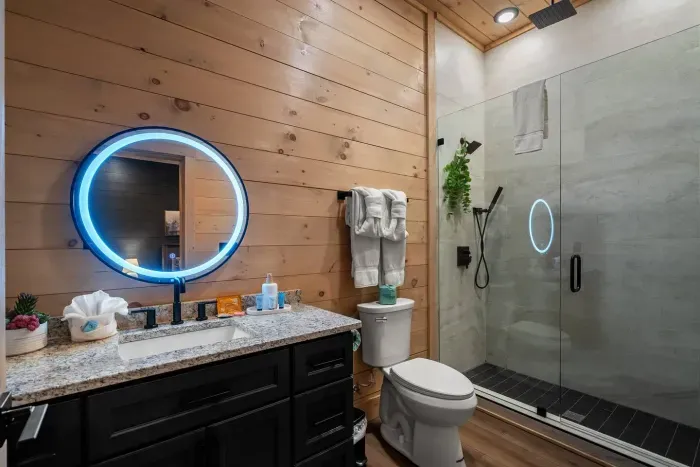 ensuite bathroom to downstairs queen bedroom.