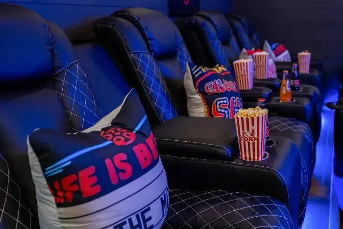 Family movie night has never looked better—plush seating, moody lighting, and space to stretch out